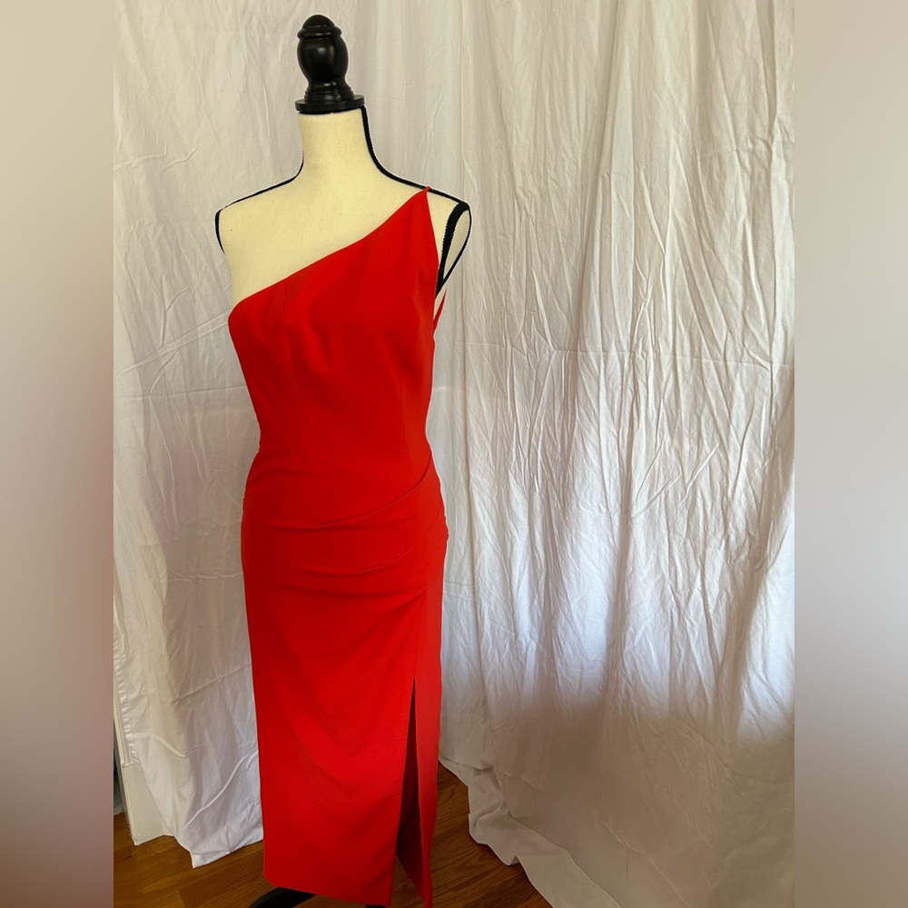 One should red dress from Manning Cartell